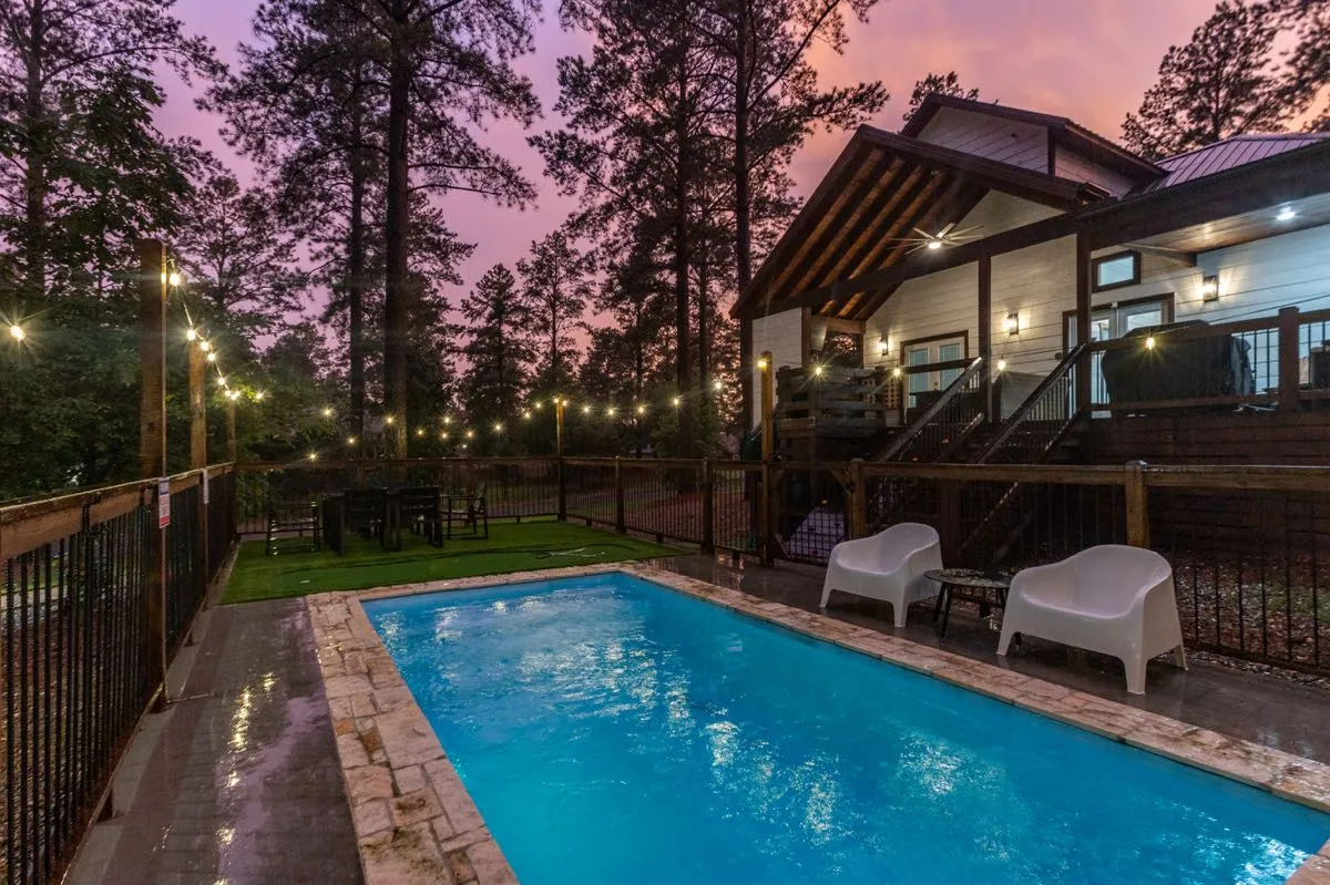 Rum N Raisin Backyard Pool Twilight Cabin