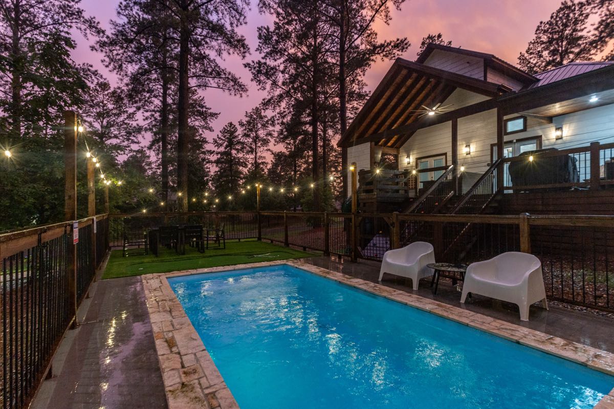 02rum N Raisin Backyard Pool Twilight Cabin