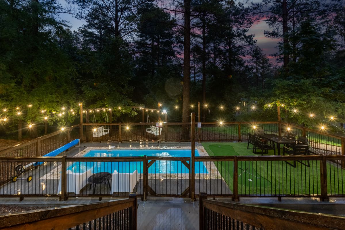 Rum N Raisin Backyard Pool Night Wide